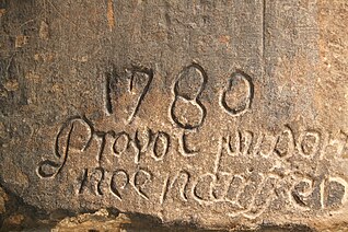 Picture of a stone with old writing.