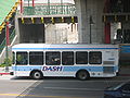 A LADOT DASH bus at Chinatown Station of the Metro Rail's Gold Line.