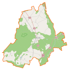 Mapa konturowa gminy Okonek, u góry znajduje się punkt z opisem „Skoki”