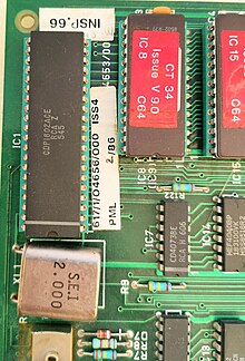 A 40 pin DIL 1802, with eproms, crystal and other support components