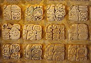 Maya glyphs in stucco at the Museo de sitio in Palenque, Mexico. An example of text in a Mesoamerican language written in an indigenous Mesoamerican writing system