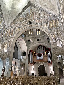 View of nave toward the portal, with fresco by Nicholas Untersteller, fully lit