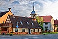 Hölzerner Glockenturm des stark erneuerten ehemaligen Hirtenhauses