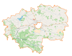 Mapa konturowa powiatu zamojskiego, blisko centrum u góry znajduje się punkt z opisem „Sitaniec-Kolonia”