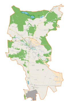 Mapa konturowa gminy Szczerców, blisko centrum na prawo u góry znajduje się punkt z opisem „Sadykierz”