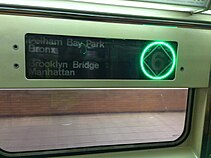 R62A LED destination sign set to a green circle (for local trains)