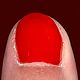 Photo of nail with red nail polish