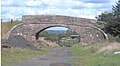 The overbridge at South Auchenmade Farm with the old Auchenmade station in the background.