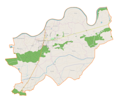 Mapa konturowa gminy Szczucin, blisko centrum na lewo znajduje się punkt z opisem „Szczucin”