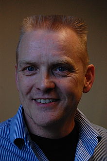 A headshot of Tom Welton