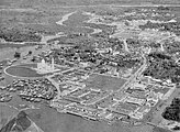 Kampong Sultan Lama (left) and the city centre in c. 1960