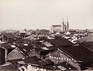 The Sacred Heart Cathedral towering over the one- and two-story homes of old Guangzhou c. 1880