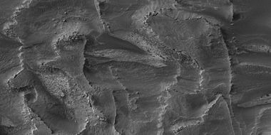 Layers breaking up into boulders in Galle Crater, as seen by HiRISE under HiWish program Location is Argyre quadrangle.