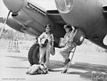 The pilot and navigator of a No. 87 Squadron Mosquito returning from a mission in 1945