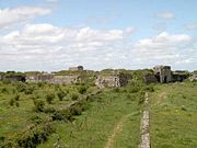 View looking towards the fortress from the south east from the remains of the Caponier