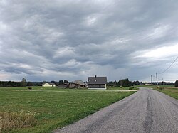 View of Handimiku village from a nearby road