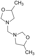 Strukturformel von 3,3′-Methylenbis(5-methyloxazolidin)