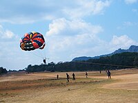 Parasailing in Pachmarhi. This particular photo was taken near Reechgarh. The towing vehicles here are cars - Maruti Gypsy.