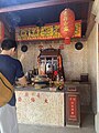 Pilgrim praying to Tua Pek Kong on Kusu Island