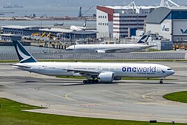 A Boeing 777-367ER (B-KQI) in Oneworld special livery