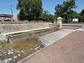 Einer der Dorfbrunnen