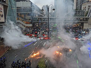 Standoff between protesters and the police at Yeung Uk Road