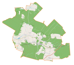 Mapa konturowa gminy Zagnańsk, blisko dolnej krawiędzi nieco na prawo znajduje się punkt z opisem „Parafiapw. Matki Bożej Częstochowskiejw Wiśniówce”