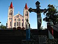 The cathedral from the stairs with the large Calvary at the terminus of the stone stairs