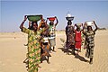 Image 2Women in Mao, where water is provided by a water tower. Access to clean water is often a problem in Chad. (from Chad)