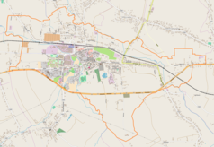 Mapa konturowa Sędziszowa Małopolskiego, w centrum znajduje się punkt z opisem „Parafiapw. Narodzenia Najświętszej Maryi Pannyw Sędziszowie Małopolskim”