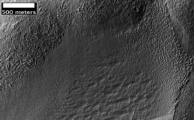 Possible Glacial Cirque in Hellas Planitia, as seen by HiRISE, under the HiWish program. Lines are probably due to downhill movement.