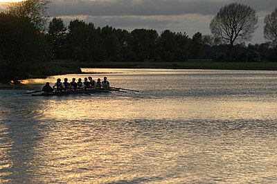 A men's crew from Keble College training for Eights Week (the main inter-college rowing races). Rowing is a popular student sport at Oxford, even though most students will not have rowed before starting at Oxford.