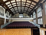 Tiered seating with balcony visible.