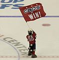 Waving a "Caps Win" flag following a playoff win in 2017.