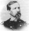 A black-and-white headshot of James W. Abert in military dress