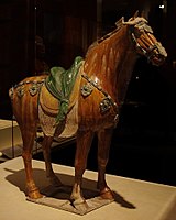 A tomb figure of a sancai glazed horse, excavated from Xi'an, Shaanxi Province