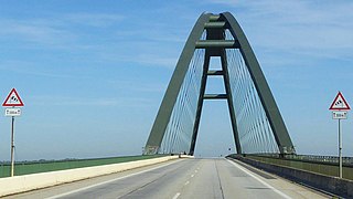 Fehmarn sound bridge seen from south. In use as a road bridge, rail bridge and with bike path