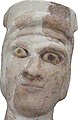 Kaolin türü kilden yapılmış insan başı figürü. (MÖ 11.-12. yy., İran Ulusal Müzesi)