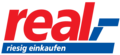 Logo mit dem ersten Slogan „riesig einkaufen“