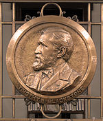 A plaque depicting Timothy Blackstone in the Blackstone Library, Chicago