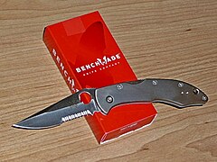 Benchmade Mini TI Pika II with Titanium handle scales and lanyard hole. Blade material: 9Cr13CoMoV (Model no.10402S-1)