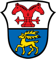 Gemeinde Pforzen Geteilt von Silber und Blau; oben ein roter Doppelspringer, dem am Fuß ein roter Pfeil unterlegt ist, unten ein schreitender goldener Hirsch.