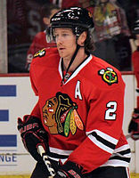 Defenseman Duncan Keith wearing the team's regular home uniform in 2011.