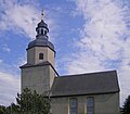 Kirche mit T-Kruzifix