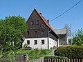 Wohnstallhaus und Scheune eines Bauernhofes