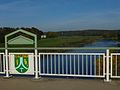 Letzte Brücke der Zwickauer Mulde vor dem Zusammenfluss mit Pilz im Wappen