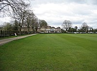 A colour photo of a cricket ground