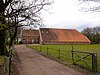 Grote boerderij van het Westerwoldse type met gemetselde schuurtopgevel