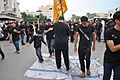 Shia Bahranis stepping over Israel flag