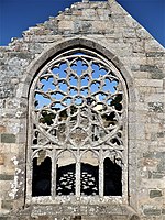 Chapelle de Languidou, Fensterrose in der Chorwand